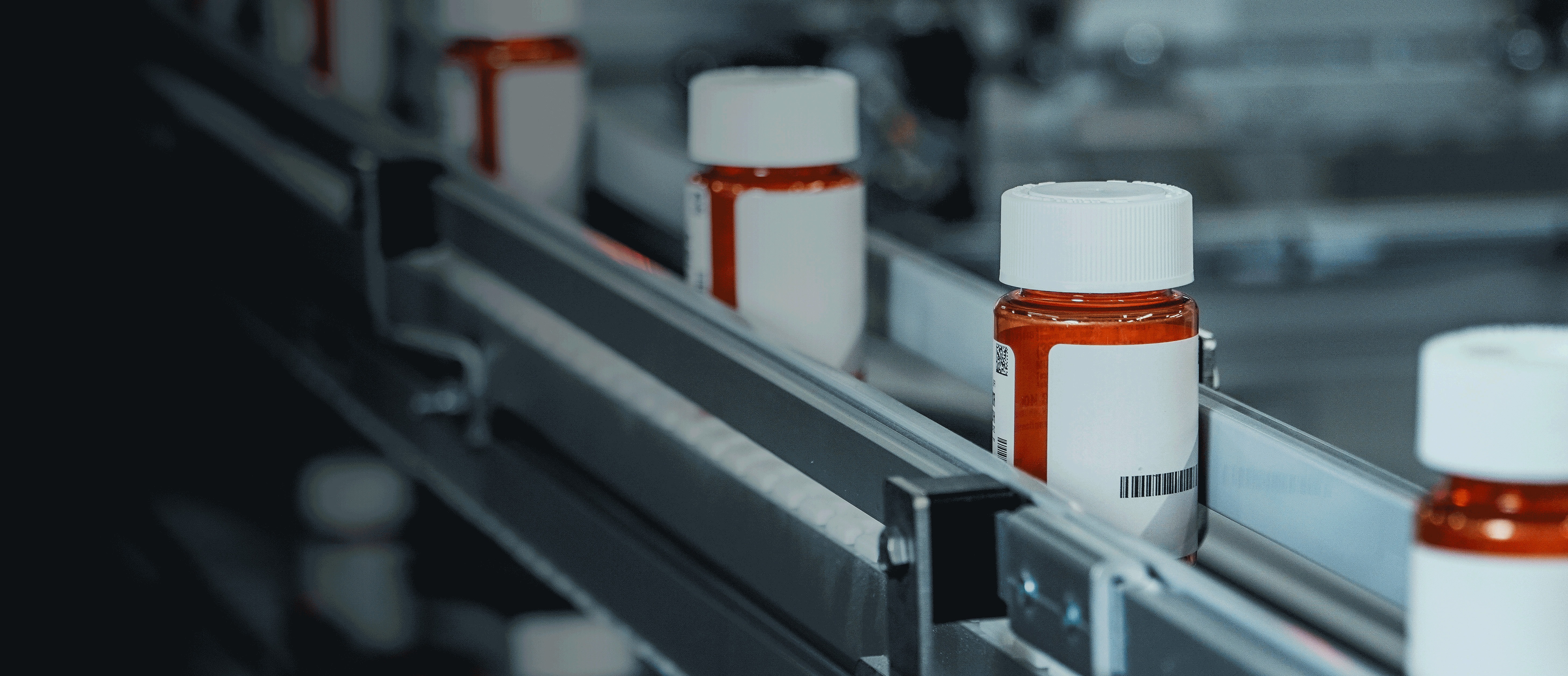 Bottles on conveyor